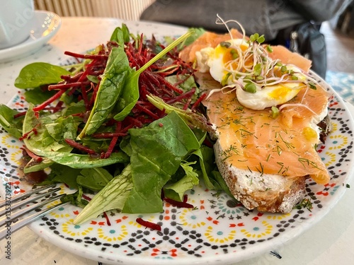Salad with egg and salmon toast