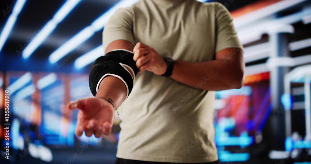 Fototapeta premium Rehabilitating athlete seeks medical treatment for knee injury