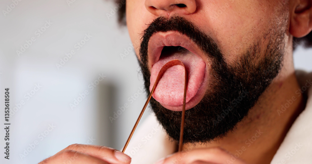 African American Dental Hygienist using tongue scraper