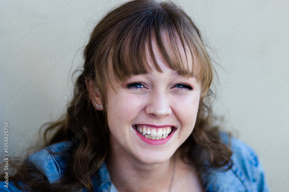 Portrait of a smiling young woman in her late teens Portrait of a smiling young woman in her late teens