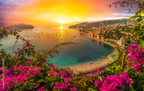 A vibrant view of Villefranche-sur-Mer on the French Riviera at sunset, France