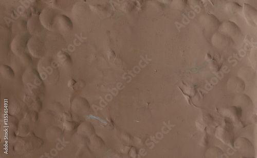 Brown plasticine texture background. Modeling clay material pattern.