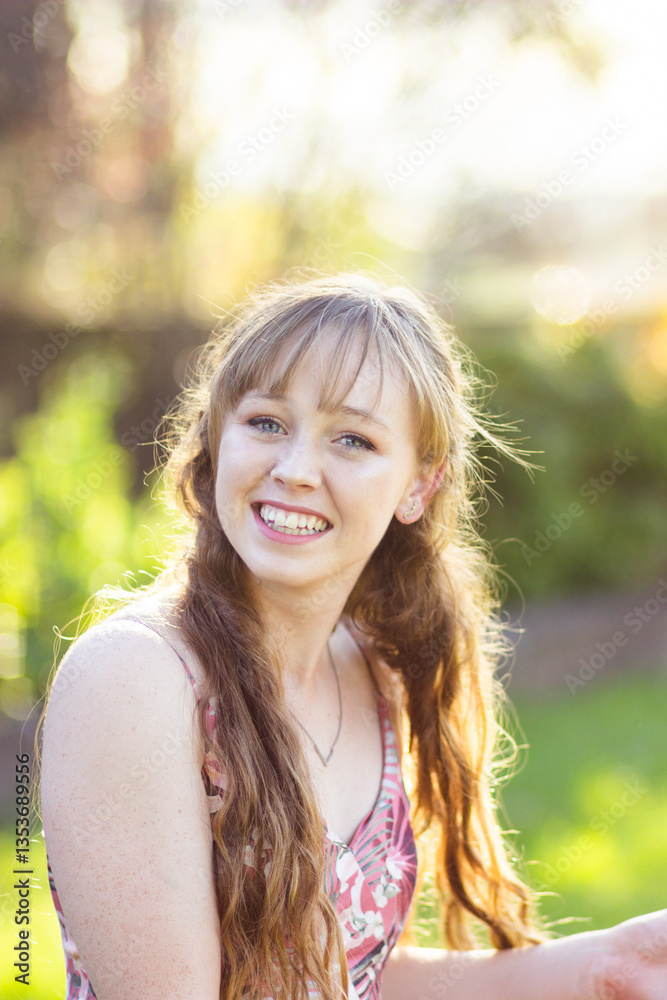 Portrait of a smiling young woman in her late teens Portrait of a smiling young woman in her late teens