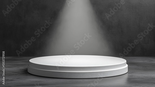 Illuminated white platform on dark background.