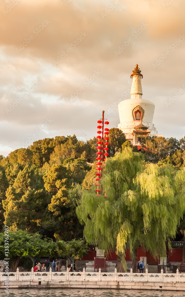 Evening light over the historic white Bai Ta tower in Beijing, China
