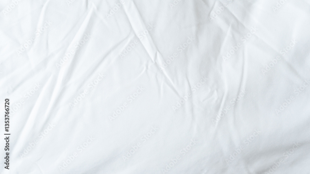 White bedsheet background, bed sheet texture, wrinkled duvet, crumpled satin blanket comforter cloth used in hotel, resort or home interior for bedding sleep comfort White bedsheet background, bed sheet texture, wrinkled duvet, crumpled satin blanket comforter cloth used in hotel, resort or home interior for bedding sleep comfort