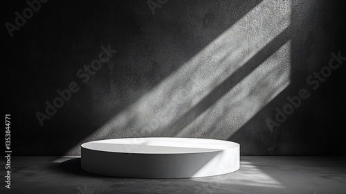 White round podium in dark room with sunlight.