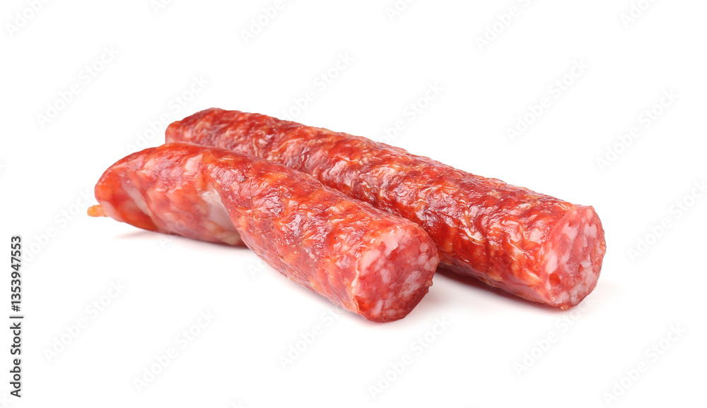 Delicious thin dry cured sausages isolated on white Delicious thin dry cured sausages isolated on white