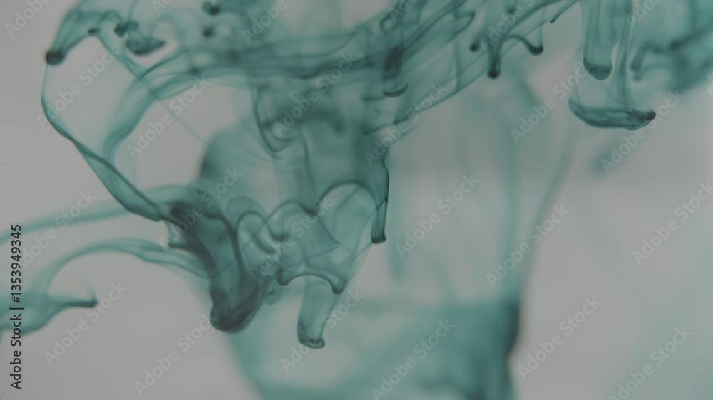 Colored ink spreading in water. Abstract smoke effect