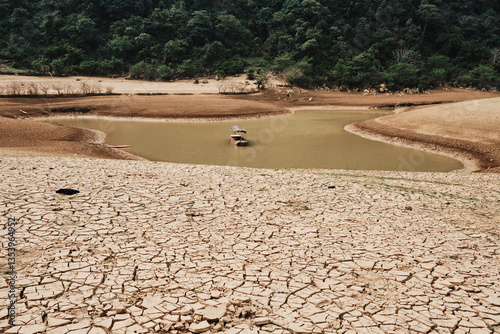 Cao Bang's Angel Eye mountain showcases dried riverbed and boat in Vietnam during dry season