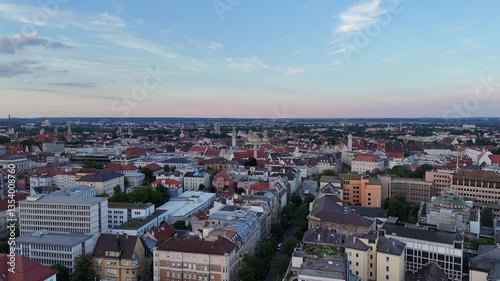 Panorama flight towards Augsburg city center with Town Hall and belltower Perlachturm, Germany