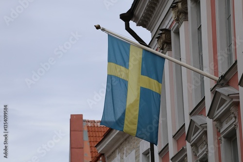 Swedish flag on the wall of an old building