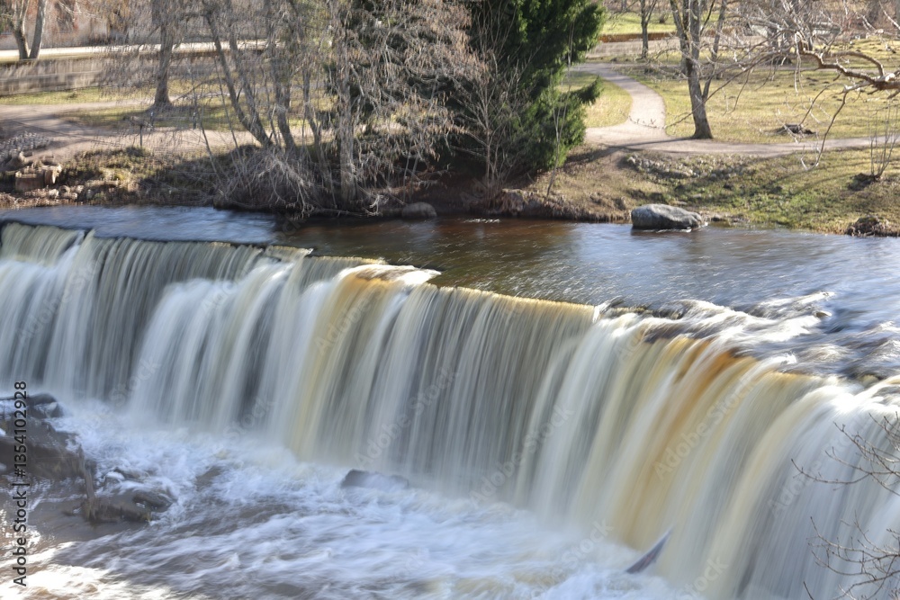 Fototapeta premium timelapse of a wide waterfall on one level