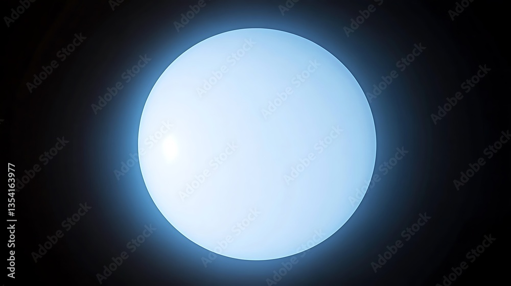 A luminous sphere of bright white light against a dark background A luminous sphere of bright white light against a dark background
