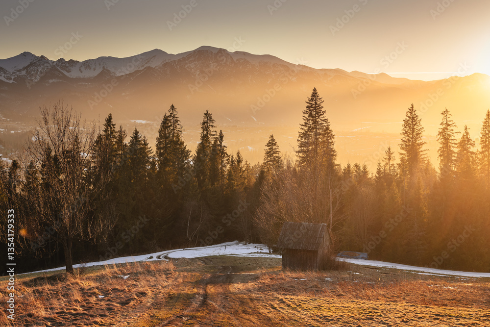 Views from Podhale towards the Tatra Mountains. This winter, there was less snow than usual, revealing more of the rugged landscape. A mix of winter and autumn colors creates a unique seasonal contras
