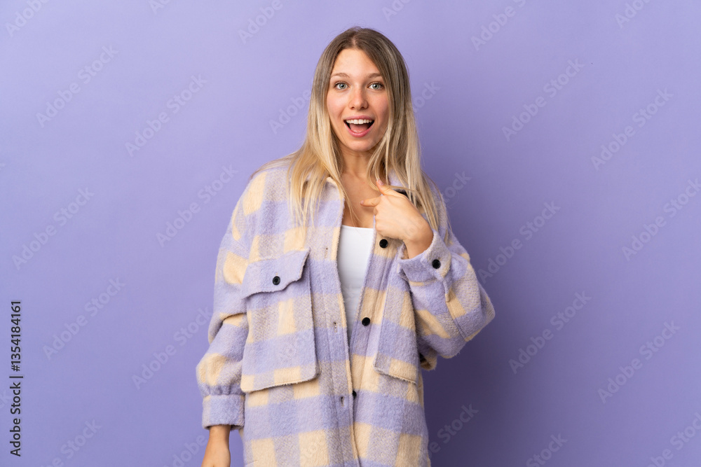 Young blonde woman isolated on purple background with surprise facial expression Young blonde woman isolated on purple background with surprise facial expression