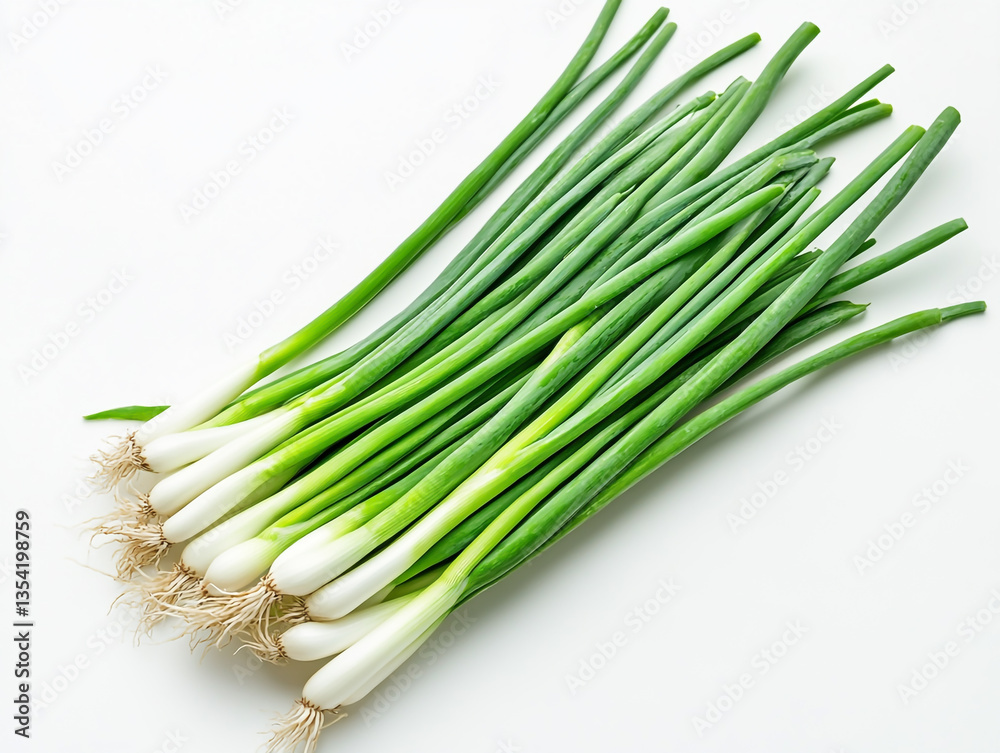 Bunch of green onions isolated on a white background, top view. Flat lay. Among the stringy, spring organic vegetables for a healthy food concept Bunch of green onions isolated on a white background, top view. Flat lay. Among the stringy, spring organic vegetables for a healthy food concept
