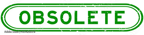 Grunge green obsolete word rubber seal stamp on white background