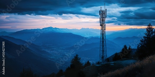 Cell Tower Silhouette: Mountain Landscape, Communication Infrastructure, Modern Technology Meets Nature, Scenic View.
