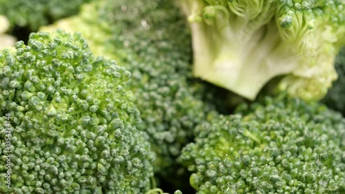Rotating of broccoli florets showcasing natural freshness, organic surface, and vivid green tones. Ideal for food, veggie, or clean eating visuals.
