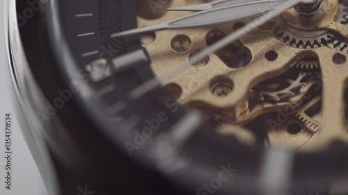 Watch mechanism macro loop. Old golden vintage clock mechanism Working, Close up shot with shallow focus. Old clock mechanism. Watch gears and arrows movement macro. Time Running.