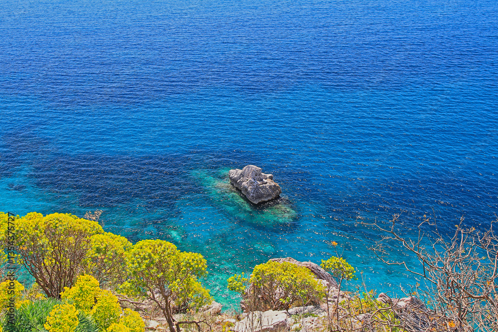 Aerial View of Big Stone Rock in Blue Water of Adriatic Sea Nature