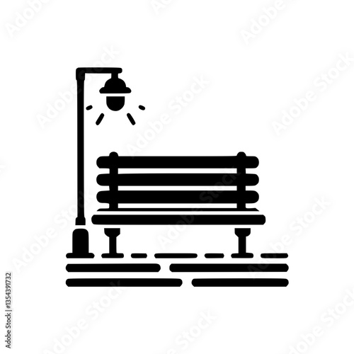 Park bench with lamp shining in urban setting  