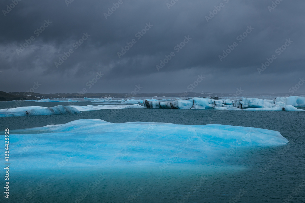 Glacial mountains in Iceland, showcasing rugged peaks and icy landscapes. A breathtaking view of nature's raw power, shaped by time and elements. Perfect for travel, adventure, and nature themes.