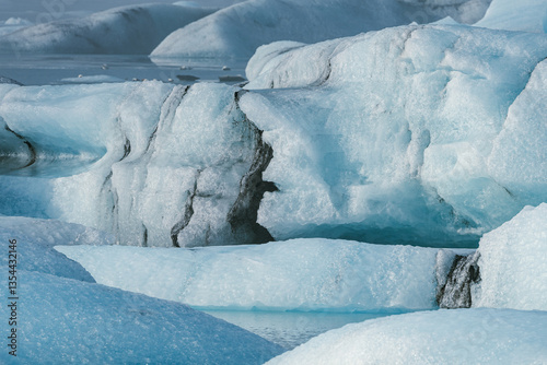 Glacial mountains in Iceland, showcasing rugged peaks and icy landscapes. A breathtaking view of nature's raw power, shaped by time and elements. Perfect for travel, adventure, and nature themes.