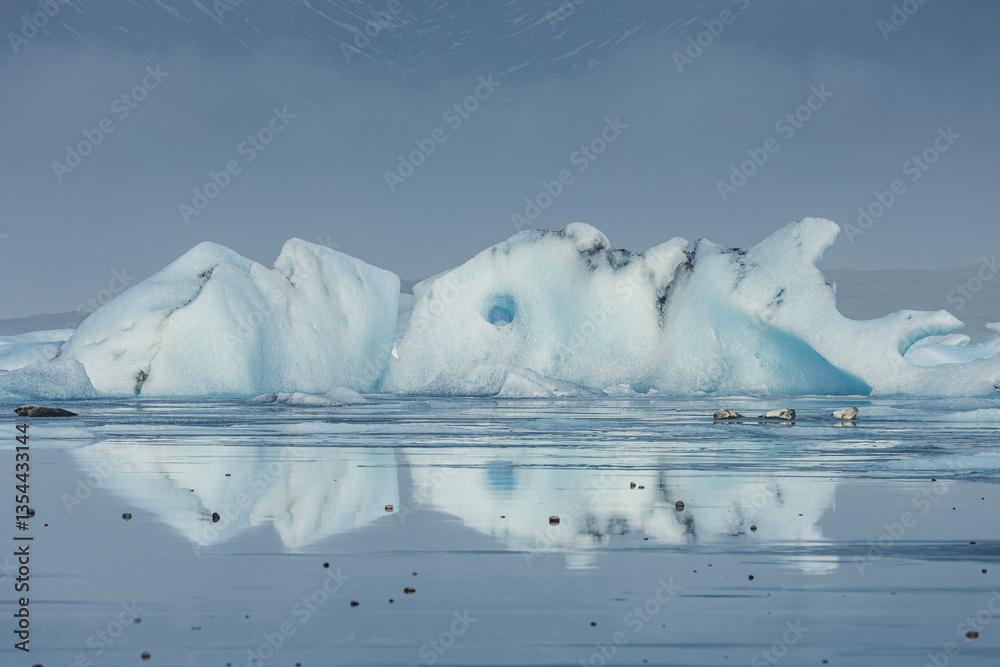 Glacial mountains in Iceland, showcasing rugged peaks and icy landscapes. A breathtaking view of nature's raw power, shaped by time and elements. Perfect for travel, adventure, and nature themes.