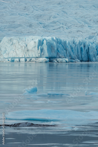 Glacial mountains in Iceland, showcasing rugged peaks and icy landscapes. A breathtaking view of nature's raw power, shaped by time and elements. Perfect for travel, adventure, and nature themes.