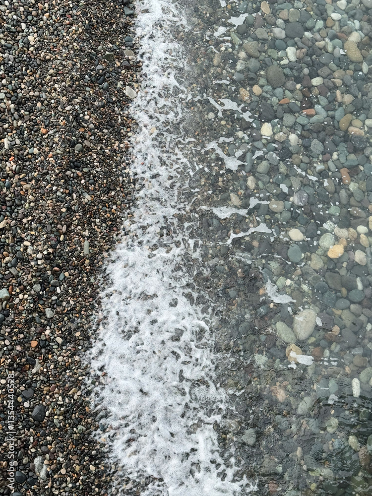 Gentle waves washing over a pebble beach