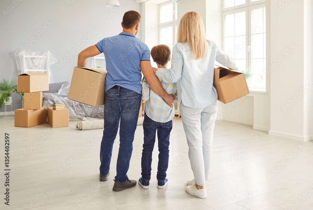 Fototapeta premium Happy family standing rear entering new flat home owners, parents close with cute small kid son on moving day, tenants, renters homeowners and child in living room, property buyer relocating 