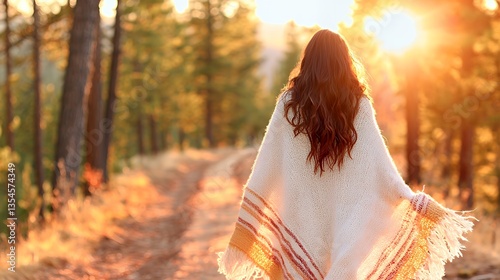 Woman Walks Along Forest Path at Sunset Wearing Warm Shawl