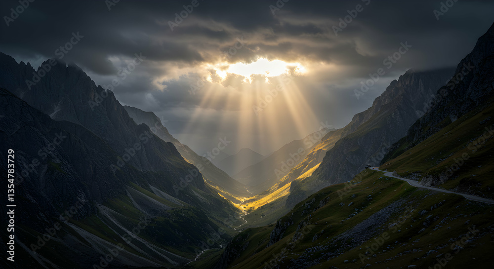 Obraz premium Sun Rays Shining Through Dramatic Mountain Valley Landscape