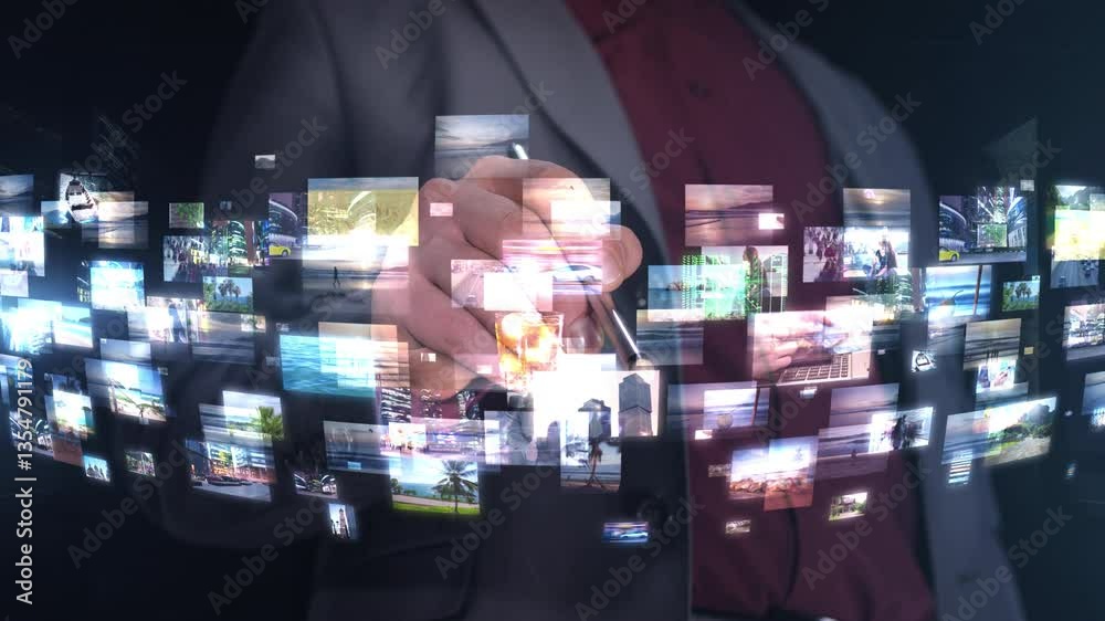 Businessman managing digital multimedia gallery with images and videos