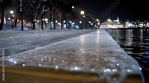 Wallpaper Mural Frozen winter embankment at night.  Snowy, icy walkway by a river, illuminated by city lights Torontodigital.ca