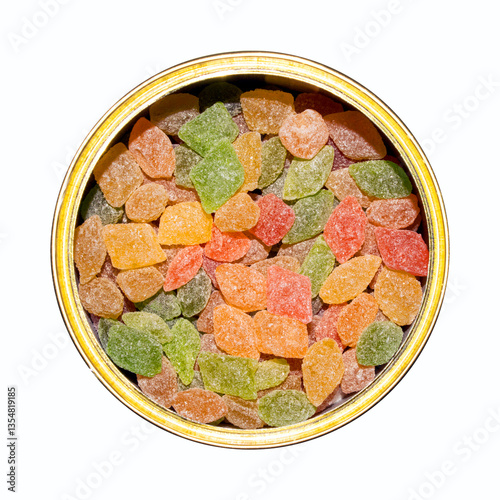 Montpensier lollipops in a tin can.Lollipops with a transparent caramel texture and a pleasant sweet and sour, citrus taste.
