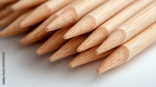 pile of toothpicks on a white background