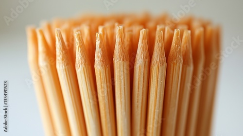 pile of toothpicks on a white background