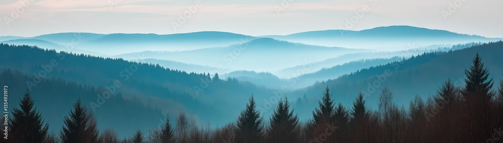 Fototapeta premium Serene panorama featuring layered mountain ranges covered with trees