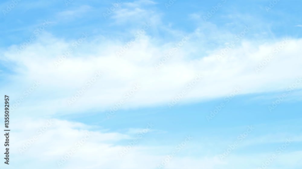A bright blue sky with fluffy white clouds. A bright blue sky with fluffy white clouds.