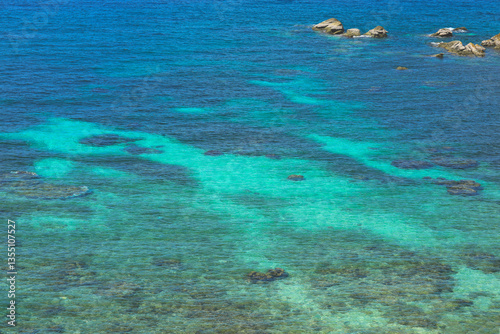 Fototapeta Naklejka Na Ścianę i Meble -  Seascape with transparent azure water, underwater stones and blue sky. Thailand. Andaman Sea