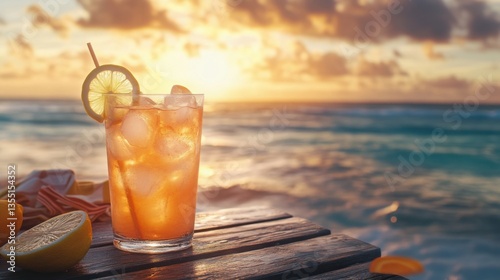 Refreshing iced cocktail with lemon slices served on a rustic wooden table overlooking a sunset-lit ocean surrounded by summer accessories free space for design