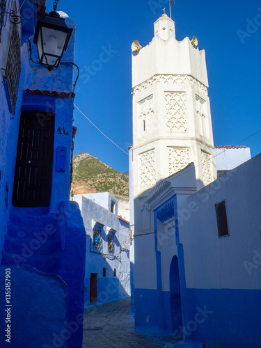 Obraz na płótnie The White Mosque of the Souk minaret above the indigo houses of Chefchaouen, Morocco w salonie