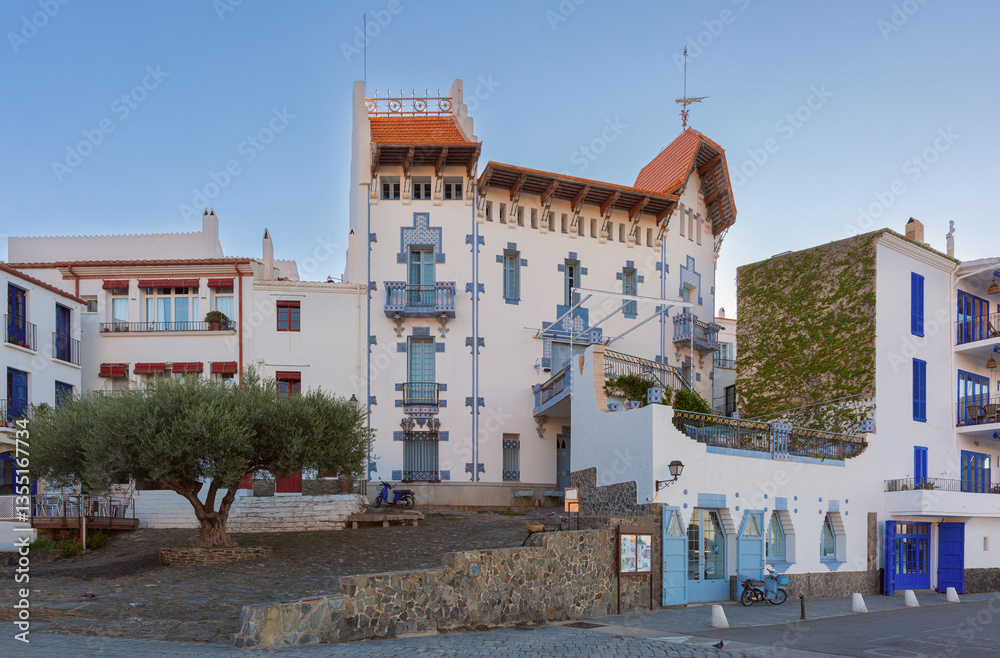 Casa Serinyana, a modernist building with blue details in Cadaques, Catalonia, Spain