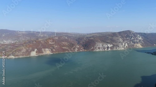 Wallpaper Mural Experience a cinematic journey along the Danube River: from rugged shores with rocks, windmills, forest, and mountains to the dramatic Golubac Fortress emerging on the hideo, Danube, Golubac, Forizon. Torontodigital.ca