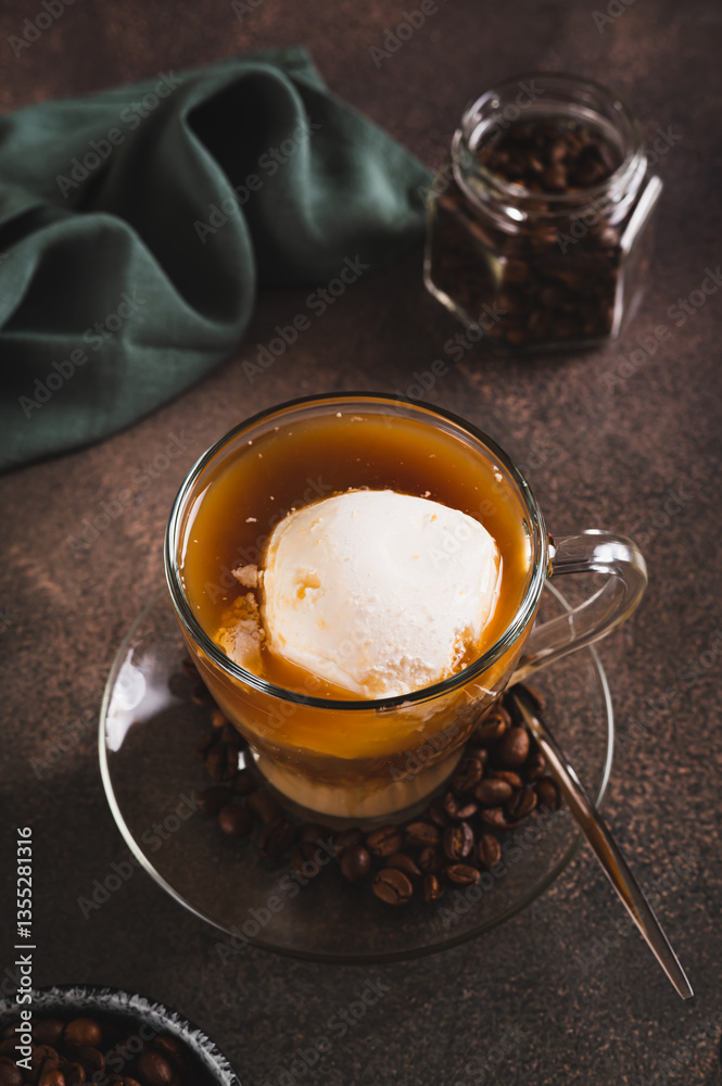 Affogato espresso coffee with vanilla ice cream in a cup on the table vertical view