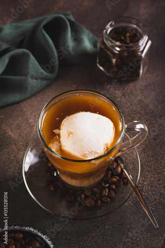 Obraz na płótnie Affogato espresso coffee with vanilla ice cream in a cup on the table vertical view w salonie