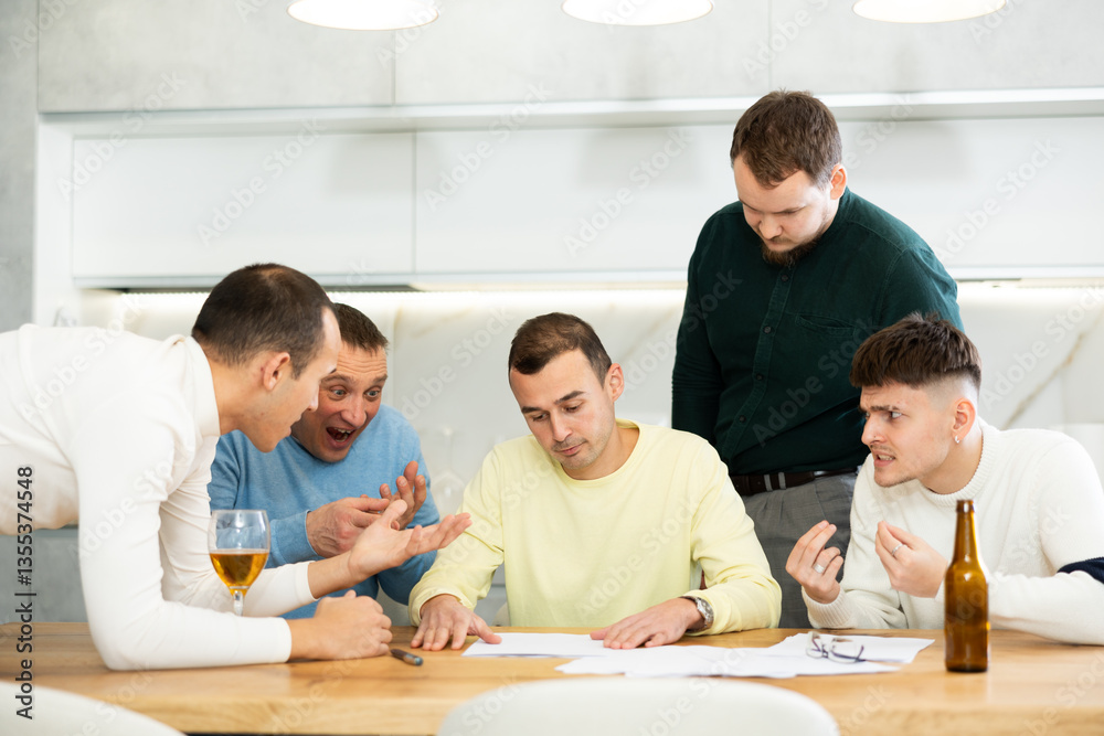 Man appearing upset as reading document, while friends gathering around, offering support and advices during friendly meeting at home kitchen.. Man appearing upset as reading document, while friends gathering around, offering support and advices during friendly meeting at home kitchen..